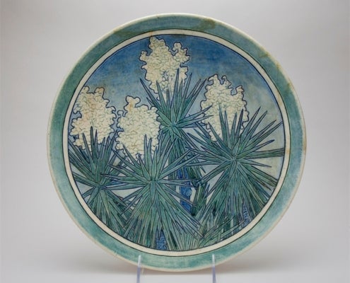 13. Plate - Yucca Design (Mary Sheerer) 1977.1-C Joseph Fortune Meyer, American Mary Givens Sheerer, American Plate with Spanish Dagger Yucca Design glossy glaze on incised clay body Gift of Miss Floy Maddox
