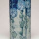 Ada Wilt Lonnegan (aka Mrs. George F.) (1879–1963) designer; Joseph Fortune Meyer (1848–1931), New Orleans, LA) potter; Vase with Hollyhock Design,1901; underglaze with glossy finish on white clay body; Newcomb Art Museum, 2009.5.1