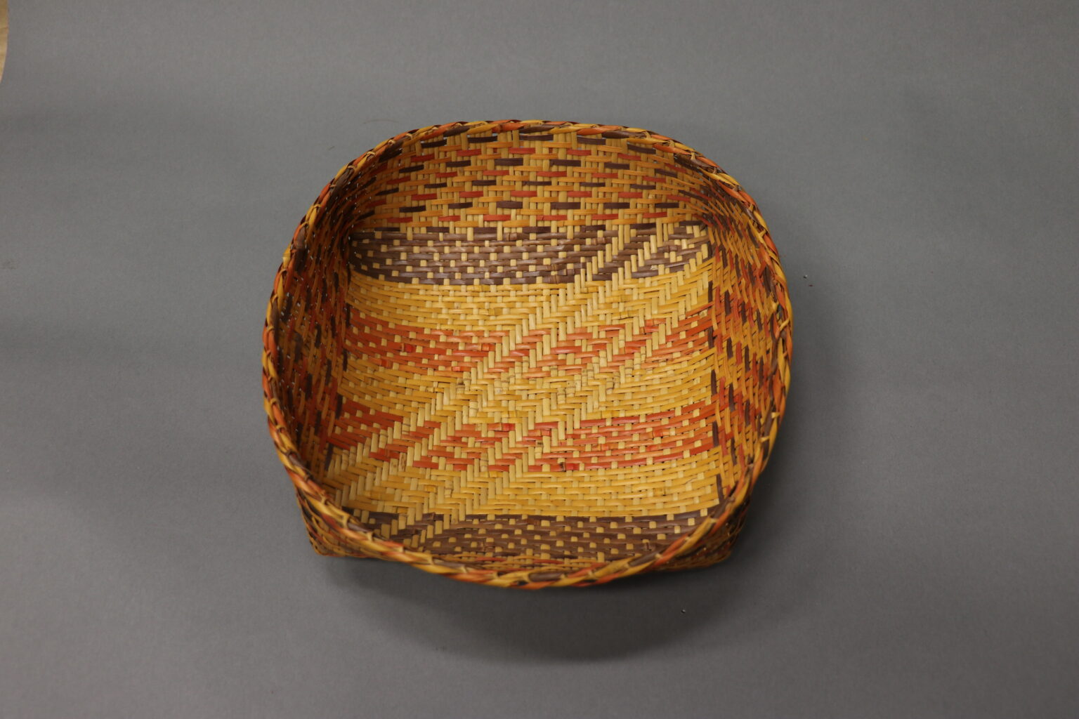 Claude Medford, Jr. Plaited Ufko (fanner basket), replicating Caddo design fragment from Mounds Plantation, 1985. Rivercane (Arundinaria gigantea).